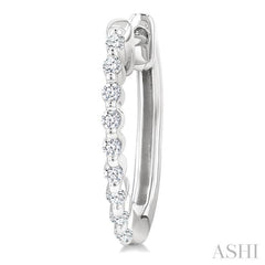1/6 Ctw Petite Shared Prong Round Cut Diamond Hoop Earring in Sterling Silver