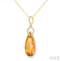 22X10 MM Pear Cut Citrine and 1/3 Ctw Round Cut Diamond Halo Semi-Precious Pendant With Chain in 14K Yellow Gold